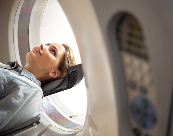 Woman entering MRI machine